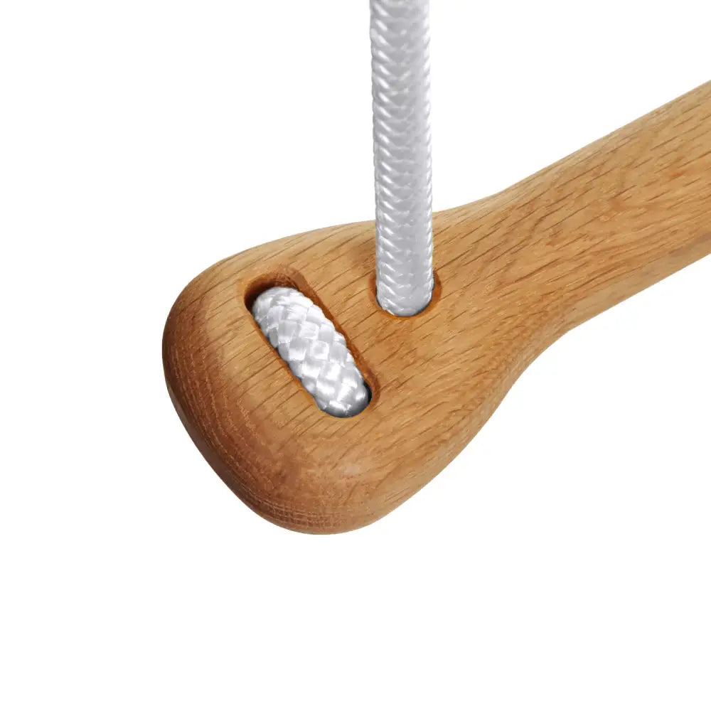 Light brown wooden climbing hold bone oak beige with white braided rope threaded through hole