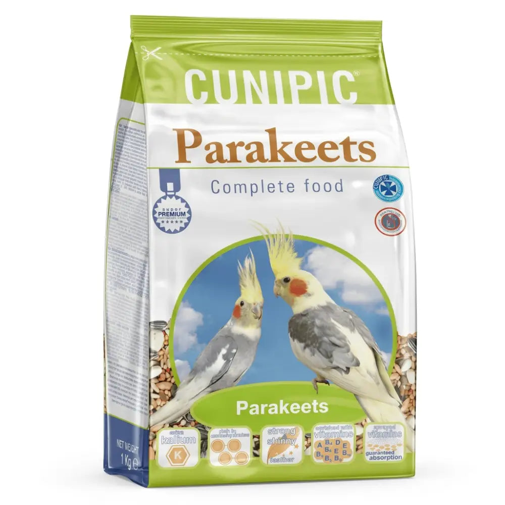 Vihreä- ja valkoinen cunipic premium parakeets 1 kg täysravintopussi, jossa kaksi cockatiel-lintukuvaa edessä
