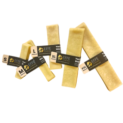 Yellowish natural dog chews from effe chews juustoluu in various sizes with black and white packaging visible