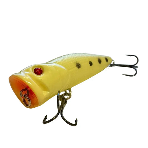 Eräjorma neon strike popper 7 cm 10 g keltainen ja oranssi pintauistin mustilla täplillä ja punaisella silmällä, varustettu kolmipiikeillä