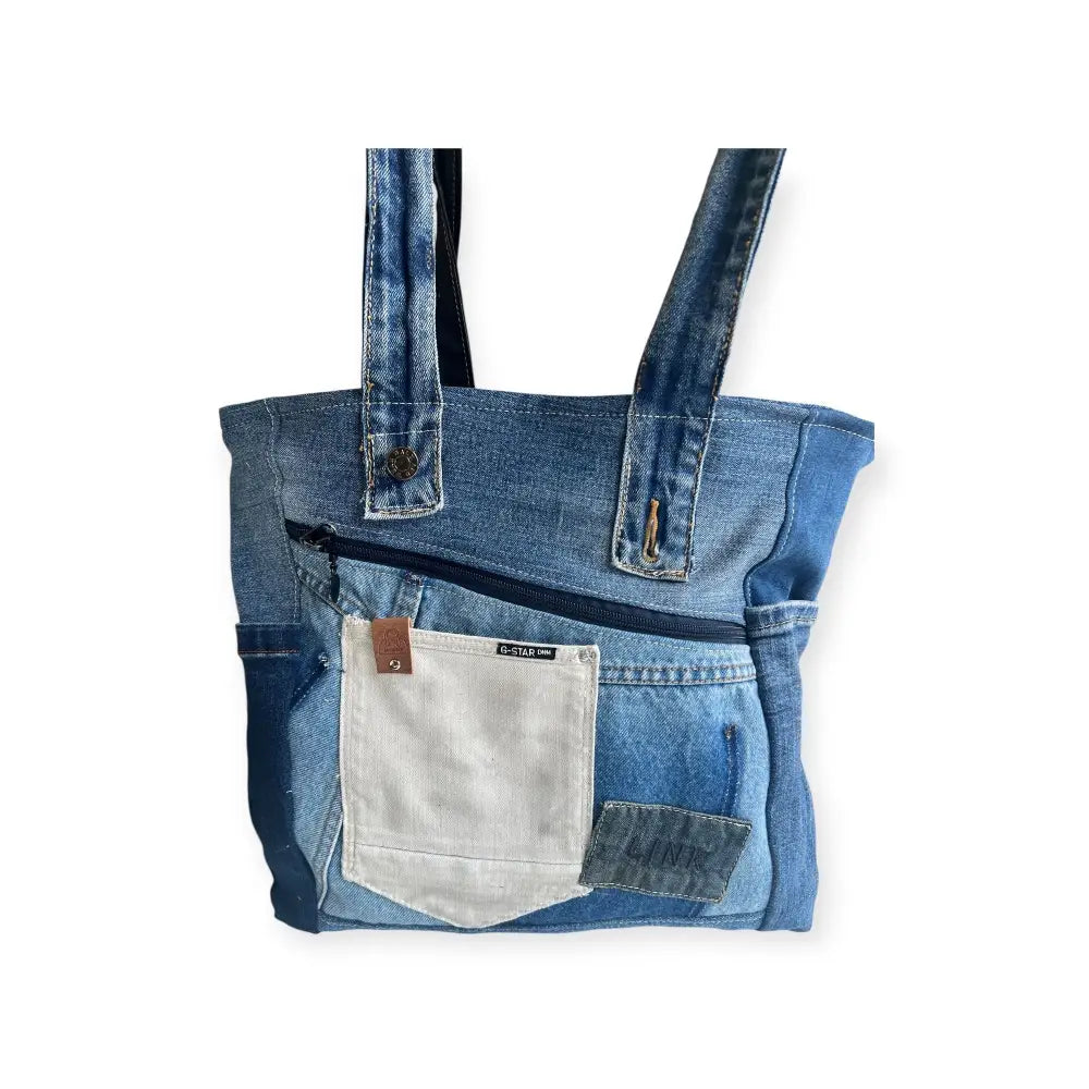 Farkkukassi veera - kierrätettyä farkkua - vaaleahko - wildpoint retkeilyvarusteet verkkokaupasta 46,90 €