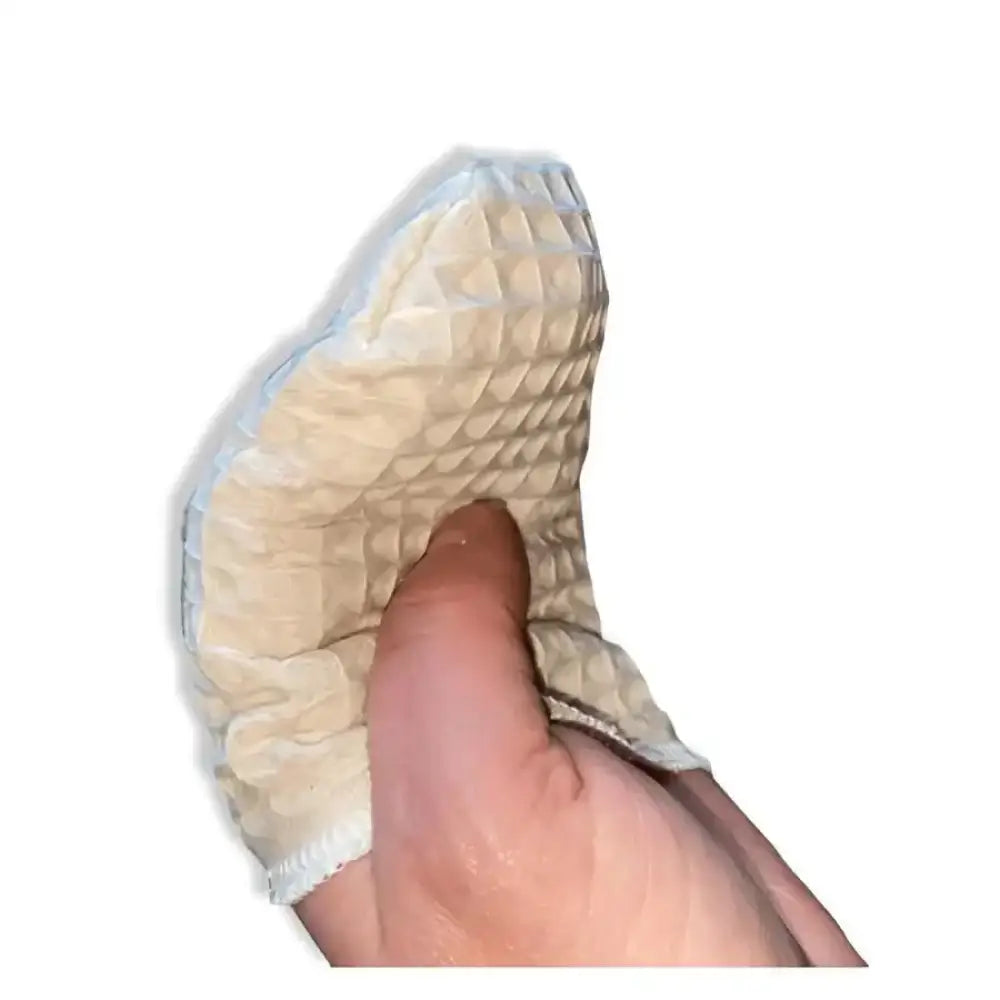 Beige kasvojen pesukinnas beige teksturoidulla, pehmeällä pesupintasieni- ja valkoisilla ommelluilla reunoilla