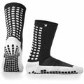Black and white lux anti slip football socks with textured grid sole and heel for enhanced traction one size calf view from back