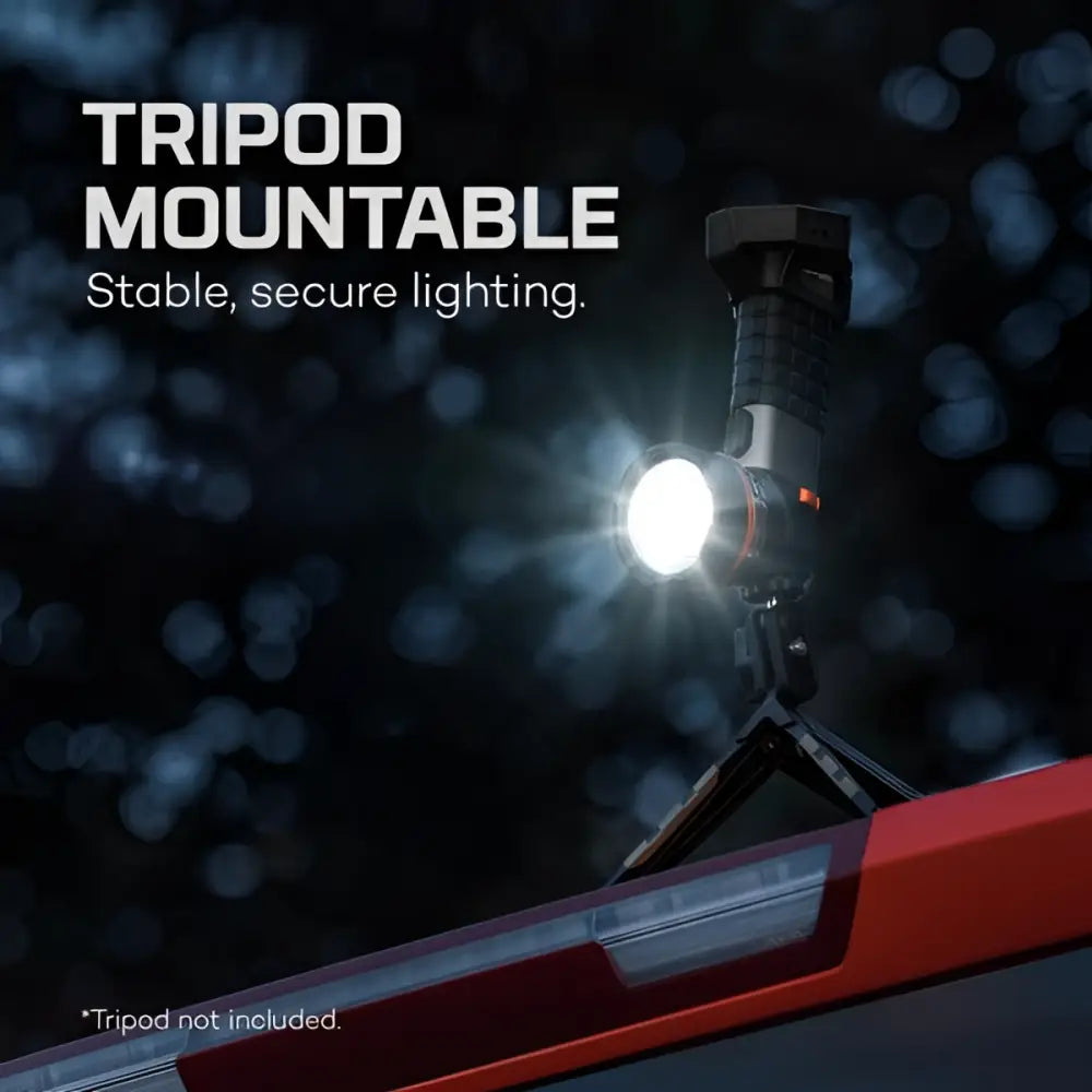 A bright led work light luxtreme sl 50 with black and silver body mounted on a tripod stand for long-range use