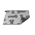 Gray fabric hand towel with black cartoon dog print made of linen by jokipiin pellava pefletti onnenkalu timber