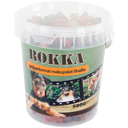 A clear plastic container with a green rokka label containing 500g of red and brown meat-flavored grain-free dog treats