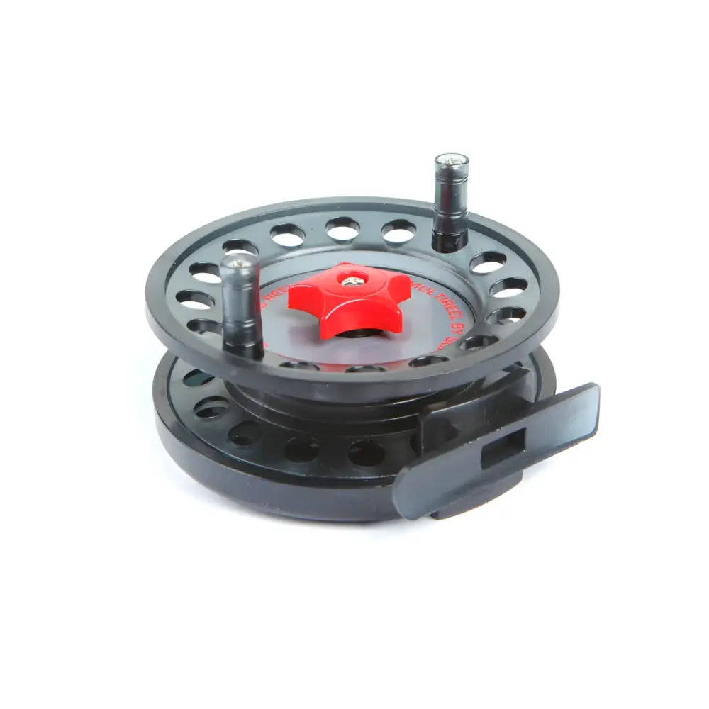 Black fly fishing reel scandinavian tackle multikela 100mm with a red star-shaped handle and silver spool knobs