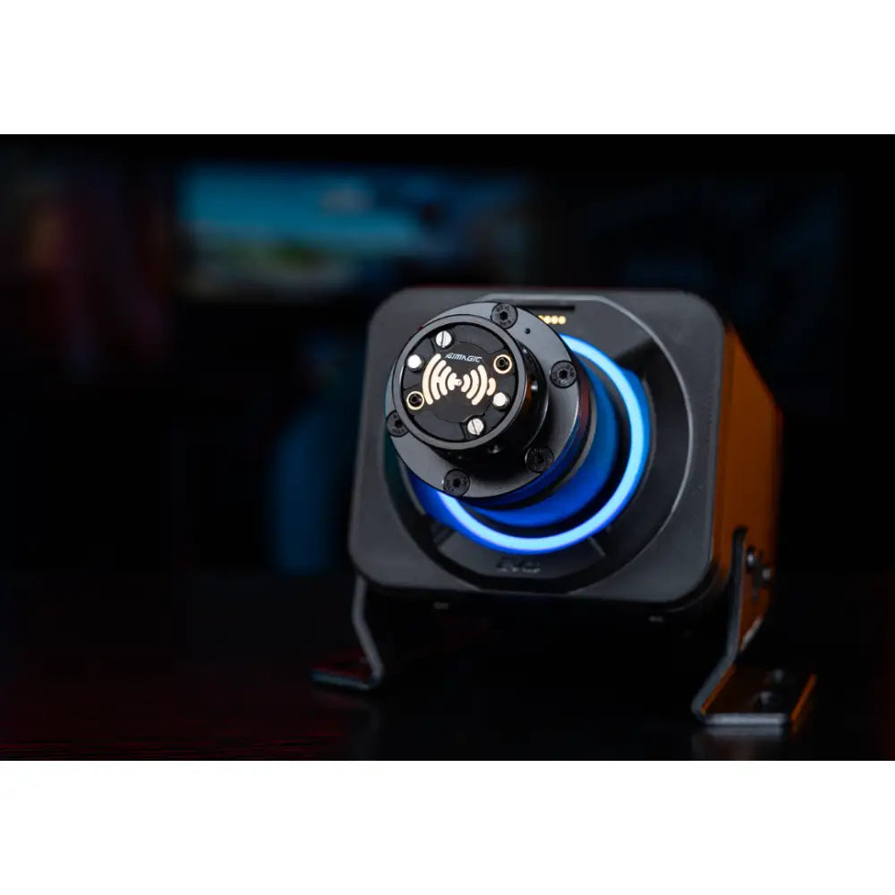 Black and orange simagic alpha evo sport wheelbase 9nm gaming joystick with glowing blue ring on central dial