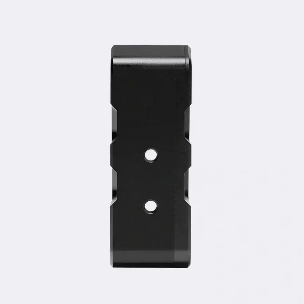 Black rectangular metal bracket for simagic p2000 haptic with two circular holes visible