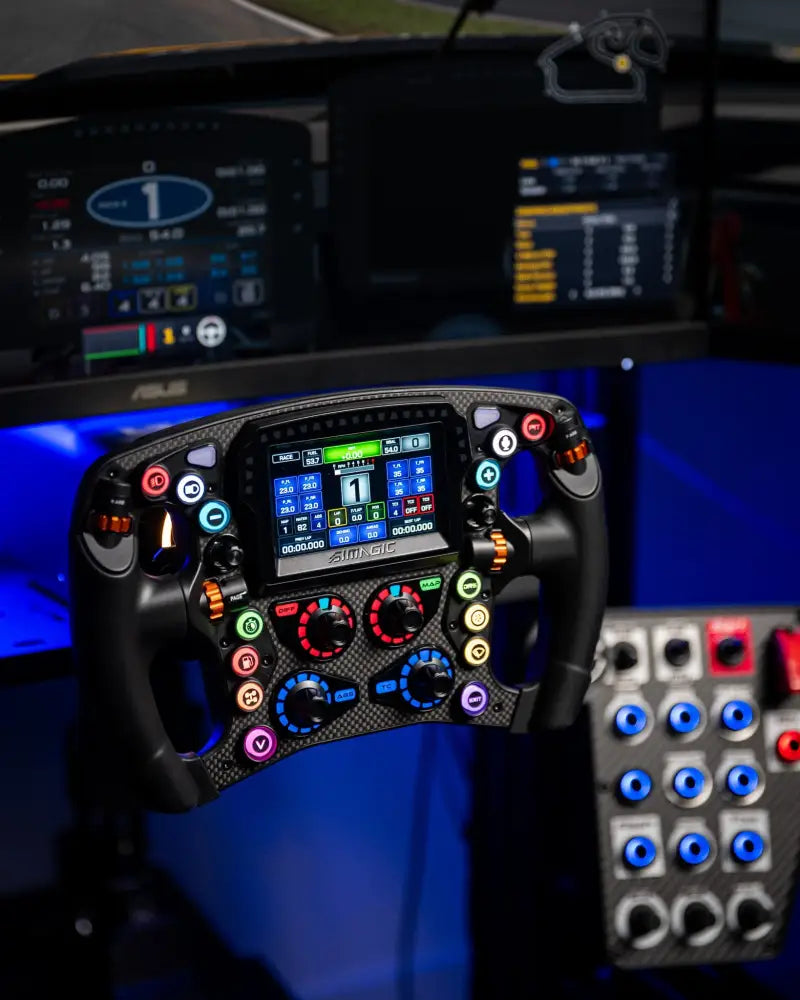 Black carbon fiber simagic zeus formula racing steering wheel with colorful illuminated buttons and central digital display