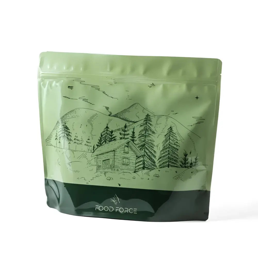 Light green resealable pouch of thai style rice with vegetables featuring a black line drawing of a mountain cabin