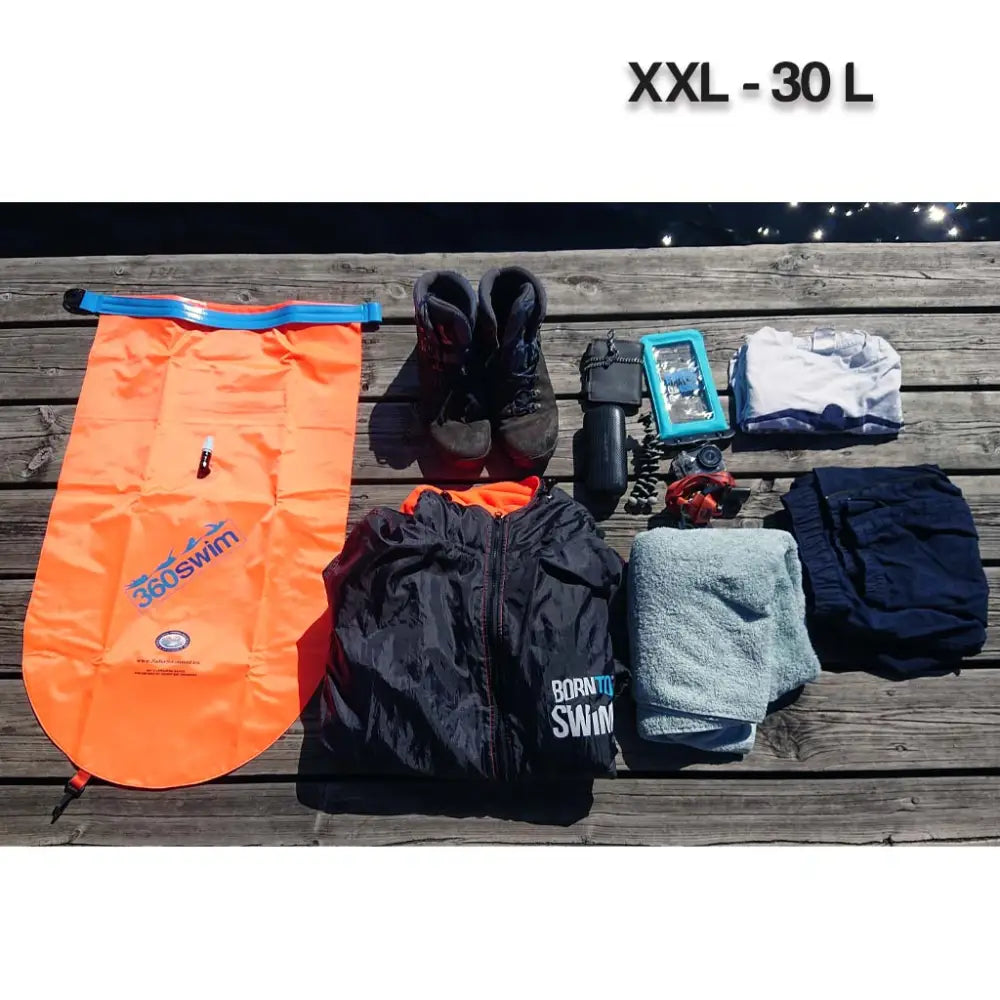 Ultra Drybag Buoy kirkkaan oranssi ilmatäytteinen uimapussi sinisellä sulkumekanismilla ja 360swim-logolla