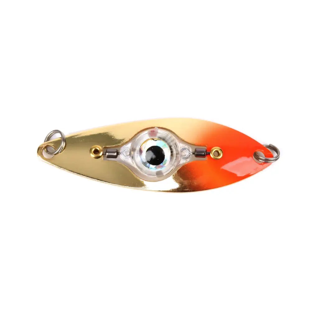 Värikylläinen väinö arcticspoon valopilkki 70mm 12g kultaoranssilla metallipinnalla ja kirkkaalla silmukalla