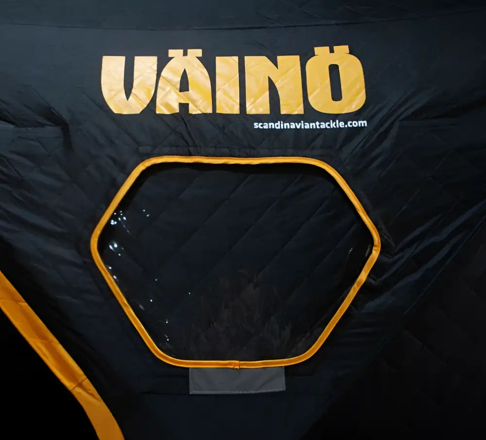 Black väinö bunker thermal extreme xxl pilkkiteltta with a bright yellow framed hexagonal window