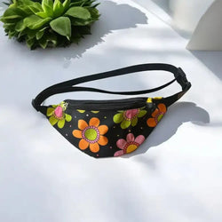 Vyölaukku allium musta fanny pack jossa kirkkaat oranssit, pinkit ja vihreät kukkakuviot